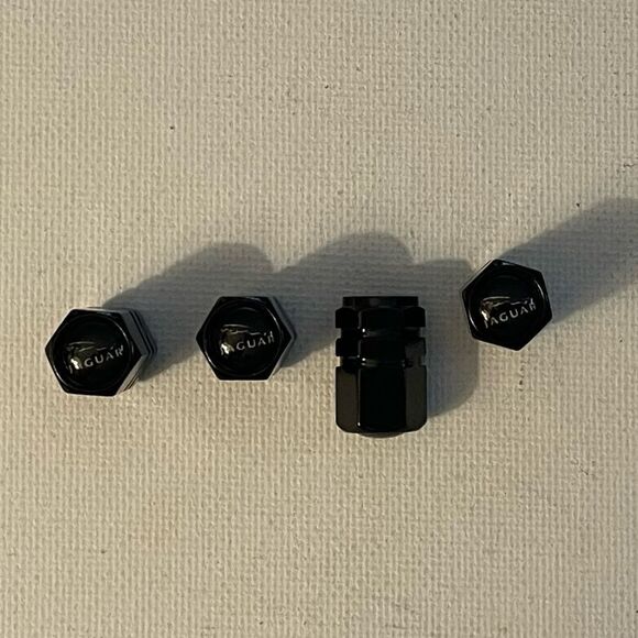 Jaguar Logo Valve Stem Caps in Black NWT - Picture 1 of 4